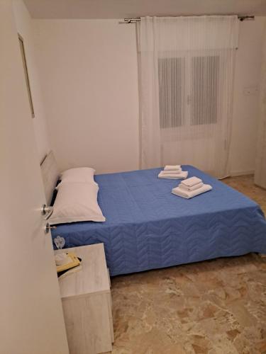 Łóżko lub łóżka w pokoju w obiekcie Apartment Angy