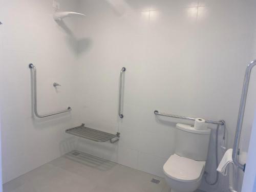 Vonios kambarys apgyvendinimo įstaigoje Neves Plaza Apart-hotel