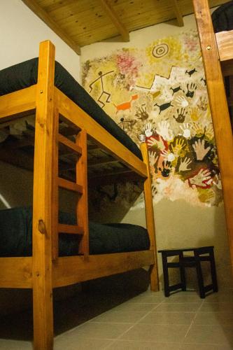 Una cama o camas en una habitación de Posada Pesca Aike Patagonico