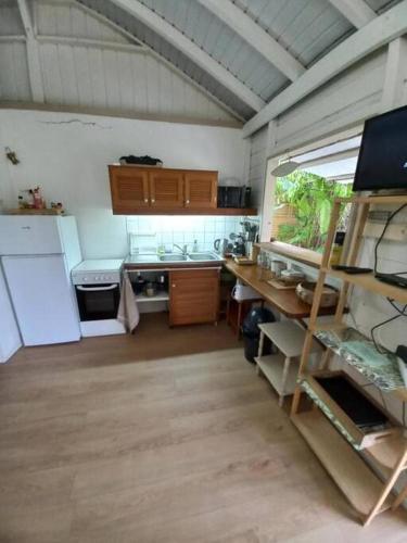 Virtuvė arba virtuvėlė apgyvendinimo įstaigoje Bungalow Vanille