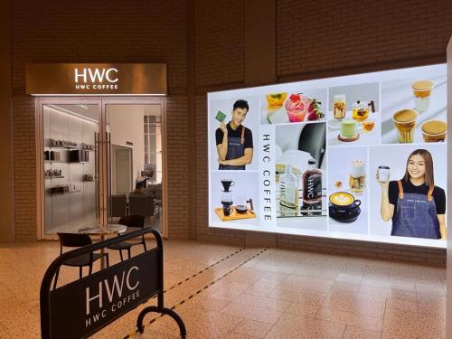 a large display case in a store with a woman on it at Millerz Suite 3R2B Condo Near MidValley 3 Beds 3 Bedrooms Staycation Best Choice in Kuala Lumpur