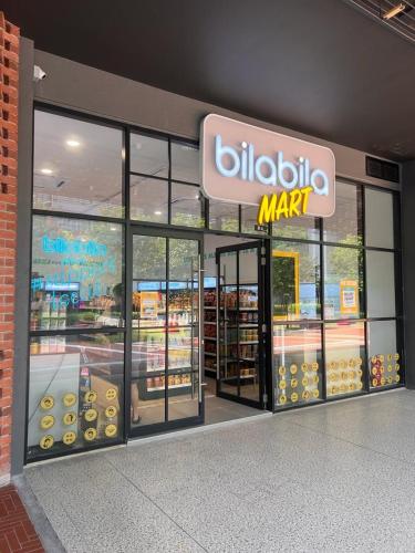 a dunkin donuts store with aldiological mark sign on the window at Millerz Suite 3R2B Condo Near MidValley 3 Beds 3 Bedrooms Staycation Best Choice in Kuala Lumpur
