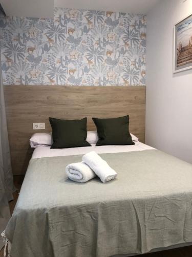 Postel nebo postele na pokoji v ubytování Loft 4 Maracena centro