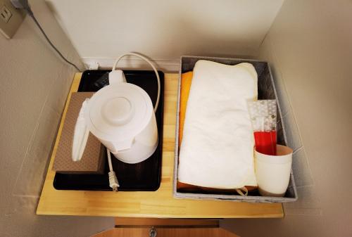 a drawer with a utensil and a white towel at belle via tokyo - Vacation STAY 32426v in Tokyo
