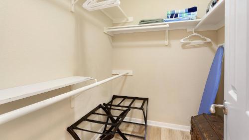a walk in closet with a ladder and a stool at Lake Travis Stunning Waterfront, Sunset & Pool Views, Pet Friendly, Boat Ramp, Lago Vista, Texas in Lago Vista