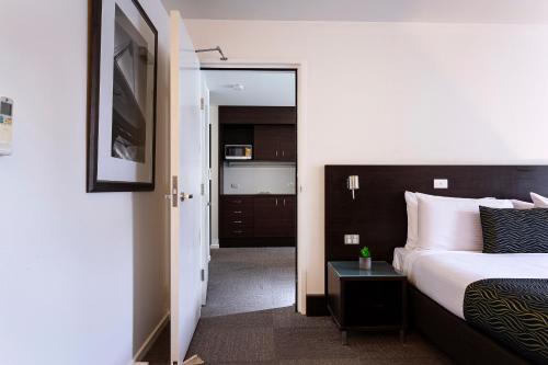 Katil atau katil-katil dalam bilik di Station Motel