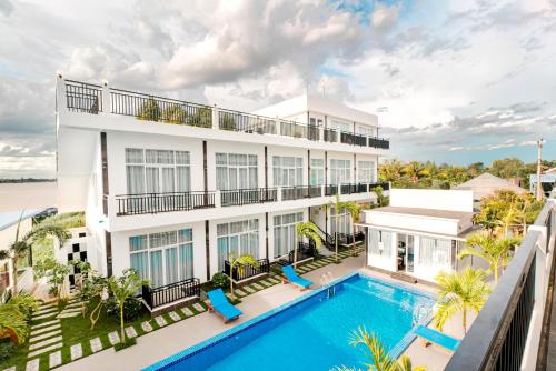 an aerial view of a building with a swimming pool at Koh Dach View Boutique Hotel in Phnom Penh