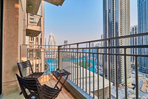Výhled na bazén z ubytování Shukran Homes Lux 1BR With Fountains View nebo okolí