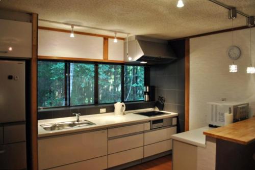 Hakuba Forest House by JAMSZ ROYALE