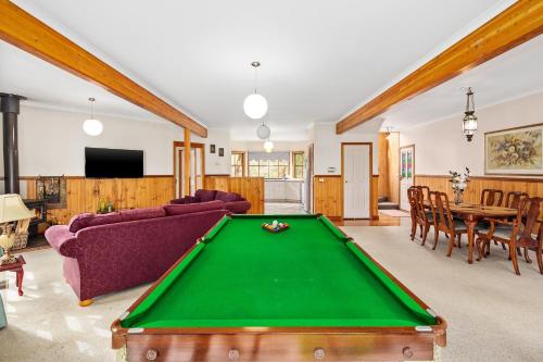 a living room with a pool table at Perfect Getaway in Phillip Island in Ventnor