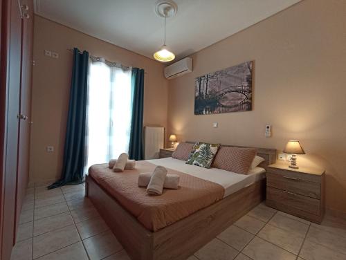 Posteľ alebo postele v izbe v ubytovaní John's Apartment 3 in Argostoli