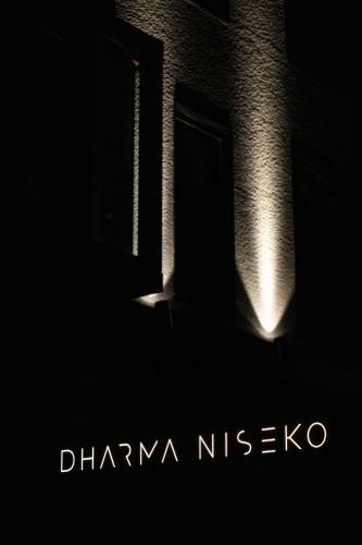 a poster for the movie dharma nikko at Dharma Niseko(ダーマニセコ) in Kutchan