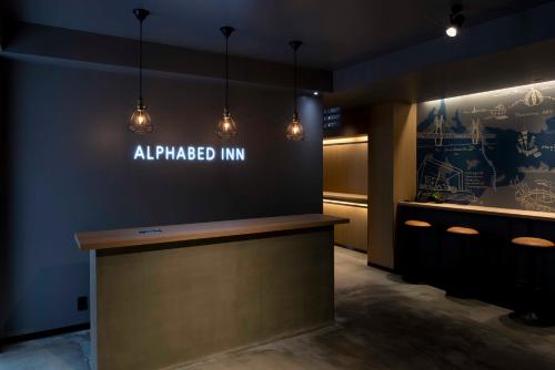 Lobbyn eller receptionsområdet på ALPHABED INN Takamatsuekimae