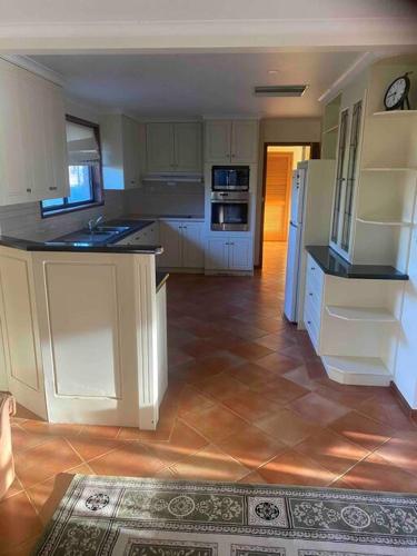 Kuchyň nebo kuchyňský kout v ubytování Bellarwi House
