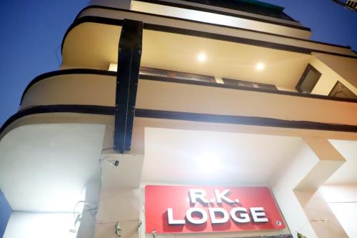 a building with a rk mortgage sign in front of it at Rk Lodge in Amritsar