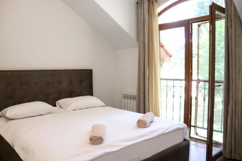 Postel nebo postele na pokoji v ubytování Dilijan Dream House 1