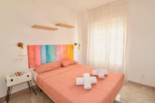 Ένα ή περισσότερα κρεβάτια σε δωμάτιο στο Maravilloso centrico, terraza
