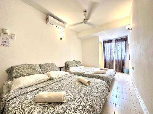 Katil atau katil-katil dalam bilik di The Homestay @ Bandar Country Homes, Rawang