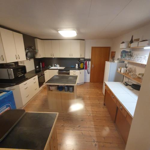 Kuchyň nebo kuchyňský kout v ubytování B&B Waldcafe