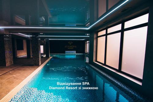 a swimming pool in the middle of a building at Готель Чарда in Bukovel