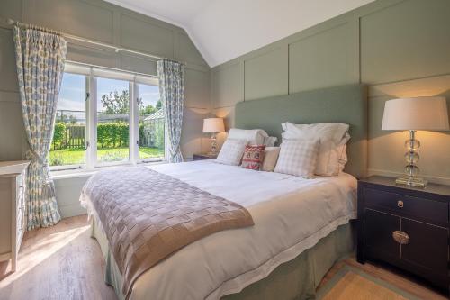 Postel nebo postele na pokoji v ubytování Elegant luxurious cottage - The Dove House