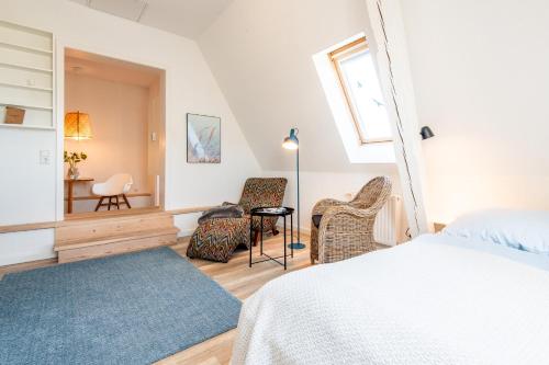 Postel nebo postele na pokoji v ubytování Steger-Hüs Wohnung 26