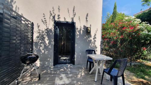 Le 30 - Duplex en rez-de-jardin proche du centre