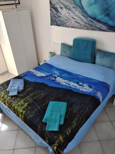 a bed with two towels on it in a room at CasarinoLaurino Among Cinque Terre Genova And Portofino in Uscio