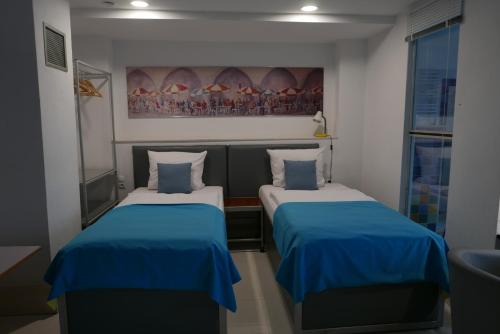 Posteľ alebo postele v izbe v ubytovaní ROOMS BYTOM