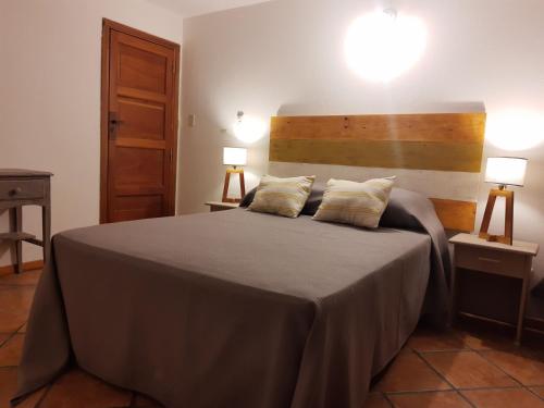 Katil atau katil-katil dalam bilik di La Castellana Hotel de Sierras