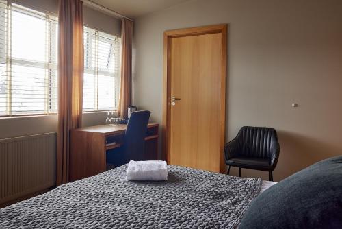 Postel nebo postele na pokoji v ubytování Hotel Frón