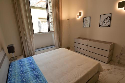 Säng eller sängar i ett rum på Servi Luxury apartment