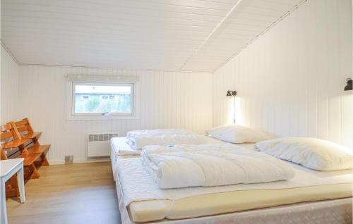 Ένα ή περισσότερα κρεβάτια σε δωμάτιο στο Four-Bedroom Holiday Home In Fjerritslev