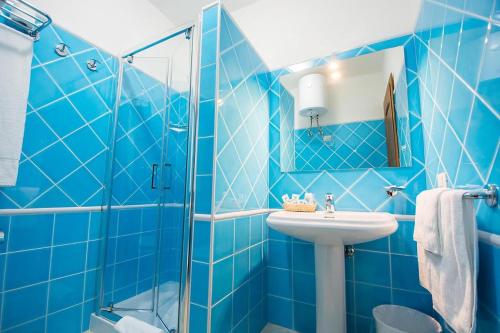 Ванна кімната в Relaxing Le Residenze del Maria Rosaria num2215
