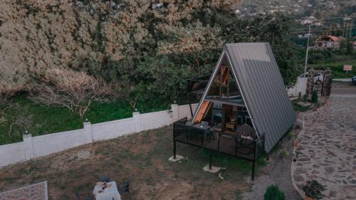 an overhead view of a house with a roof at La'Familia in Batumi