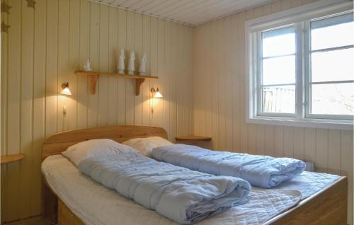 Postel nebo postele na pokoji v ubytování 3 Bedroom Nice Home In Sunds