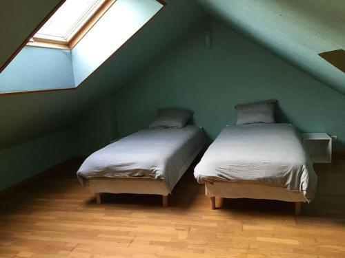 Katil atau katil-katil dalam bilik di Grand Triplex vue mer centre du village