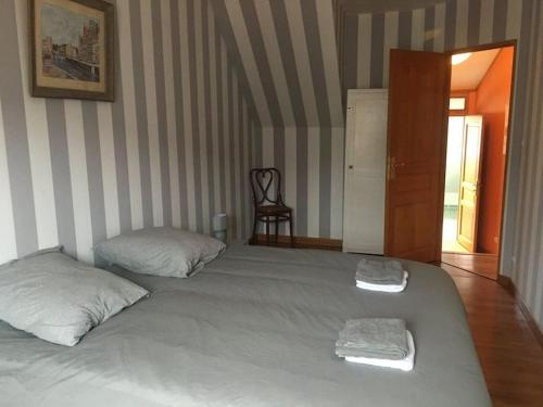 Katil atau katil-katil dalam bilik di Grand Triplex vue mer centre du village