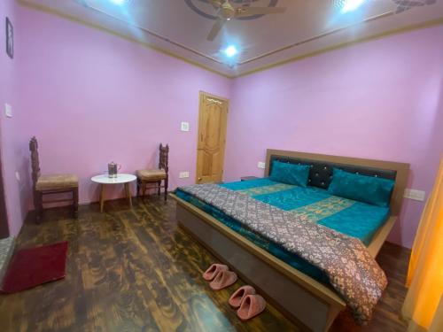 Postel nebo postele na pokoji v ubytování Penthouse Villa