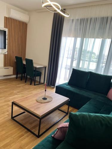 Zona d'estar a Apartman Sun