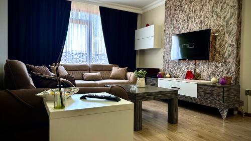 Ein Sitzbereich in der Unterkunft Overland Residence