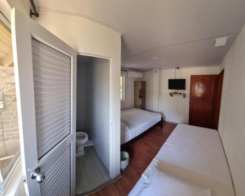 Postel nebo postele na pokoji v ubytování Apartamentos SurOeste