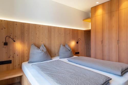 Katil atau katil-katil dalam bilik di Vista Dolomites Apartment Energy