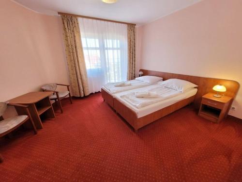 Cama o camas de una habitación en Pensjonat SPA u Tomasza