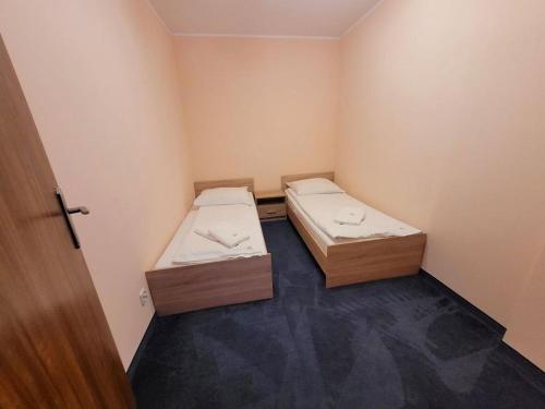 Cama o camas de una habitación en Pensjonat SPA u Tomasza