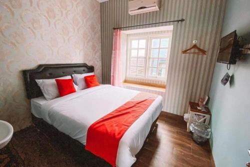 Säng eller sängar i ett rum på Violita House by FH Stay