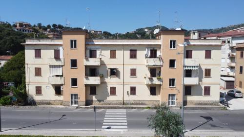 an apartment building on the side of a street at Casa Franiti - Sul Mare in Sapri