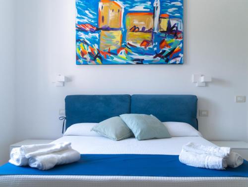 Ένα ή περισσότερα κρεβάτια σε δωμάτιο στο Biancolivo Country House