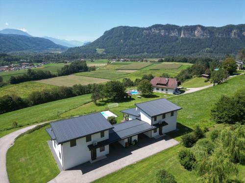 an aerial view of a house in a field at Ferienhaus Kaiser in Gallizien