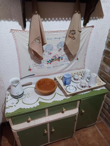 a small table with a toy boat on it at Apartments Bakine Čarolije in Karanac